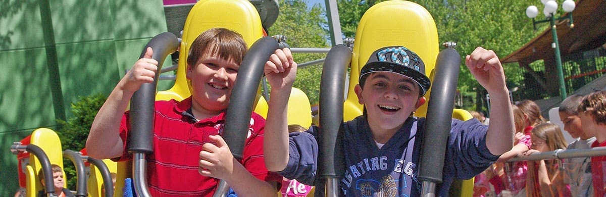 boys riding attraction